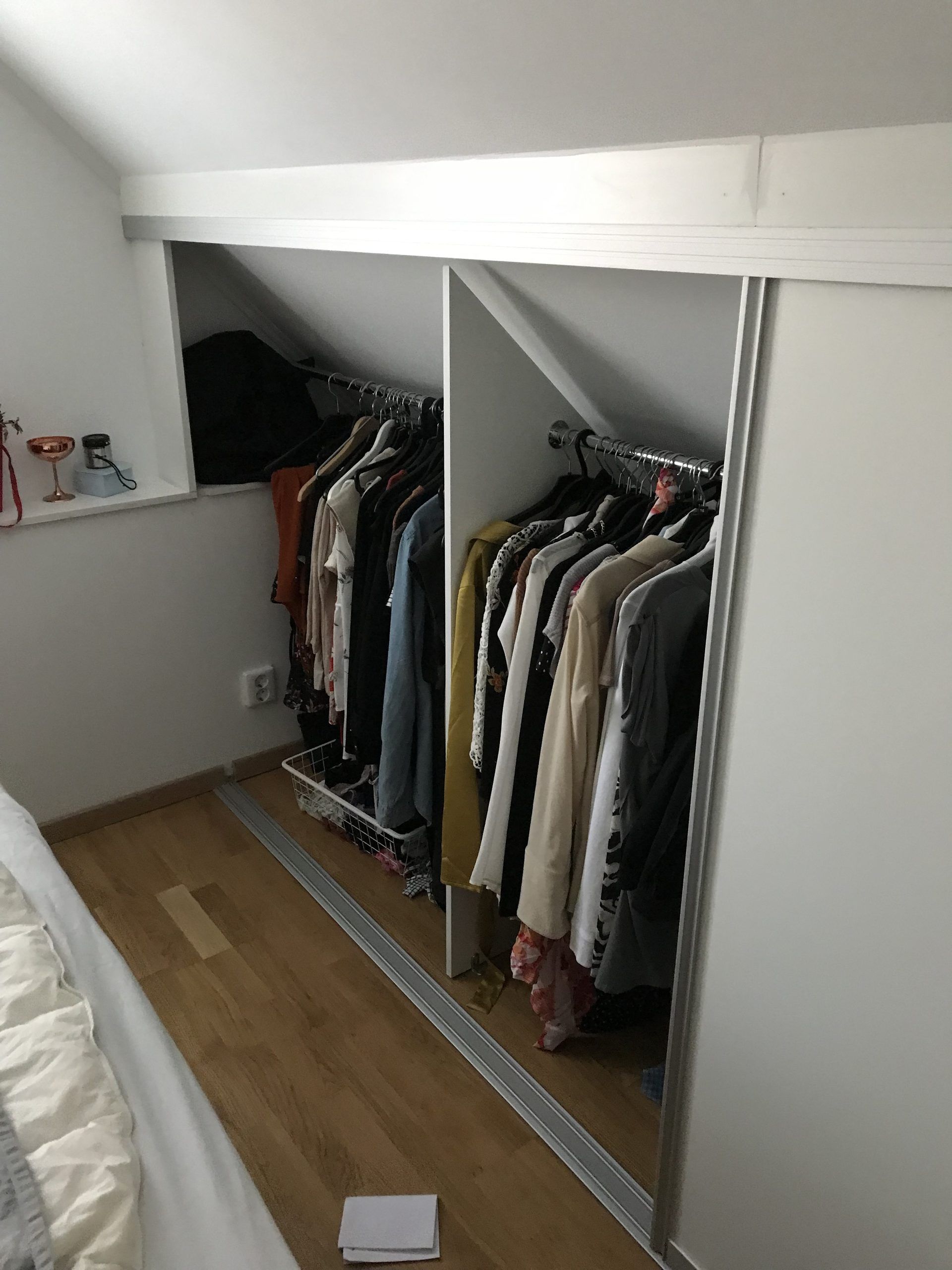 Hanging rail under a low sloped ceiling
