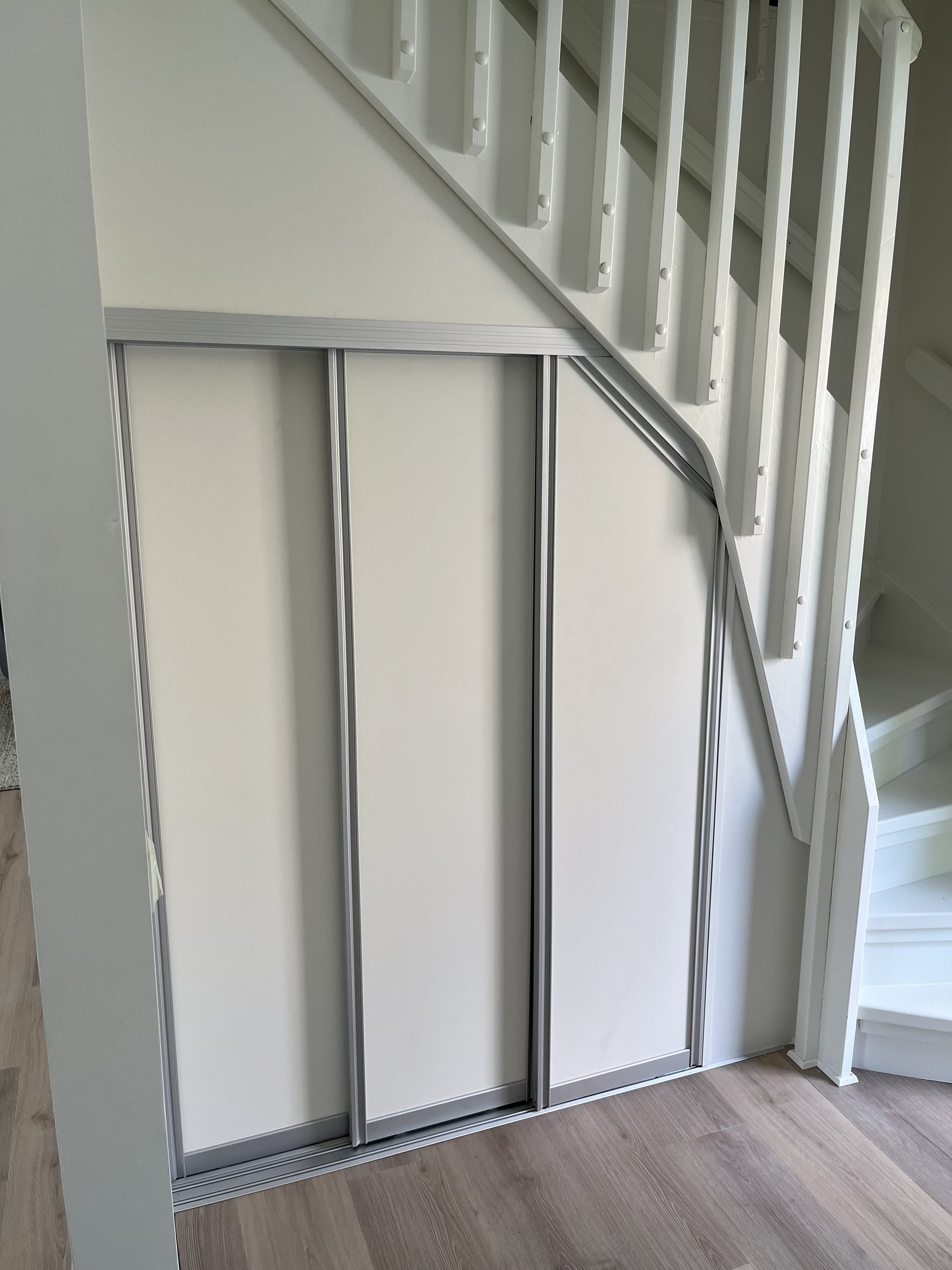 Same wardrobe, angled top meets the stair rail