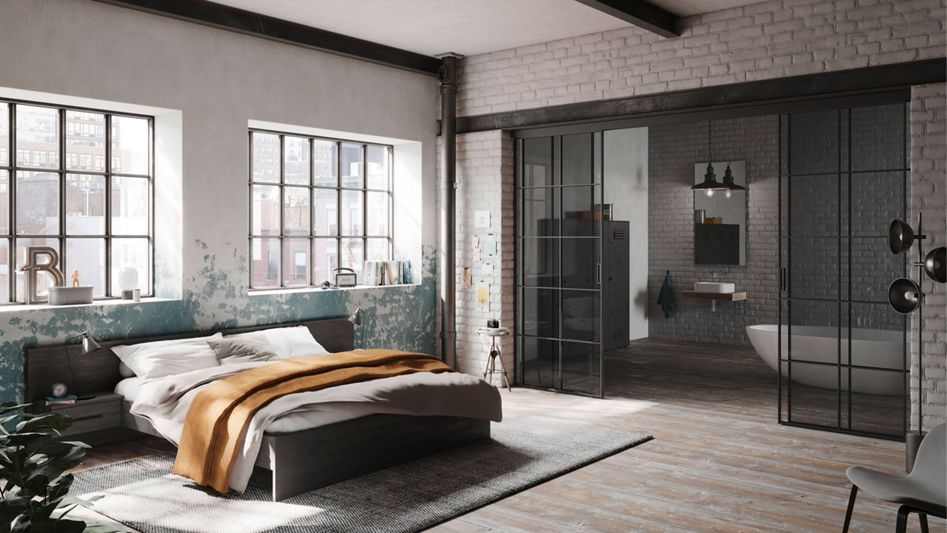 Loft bedroom with a bed and two black-framed glass sliding doors leading to a bathroom with a bathtub.